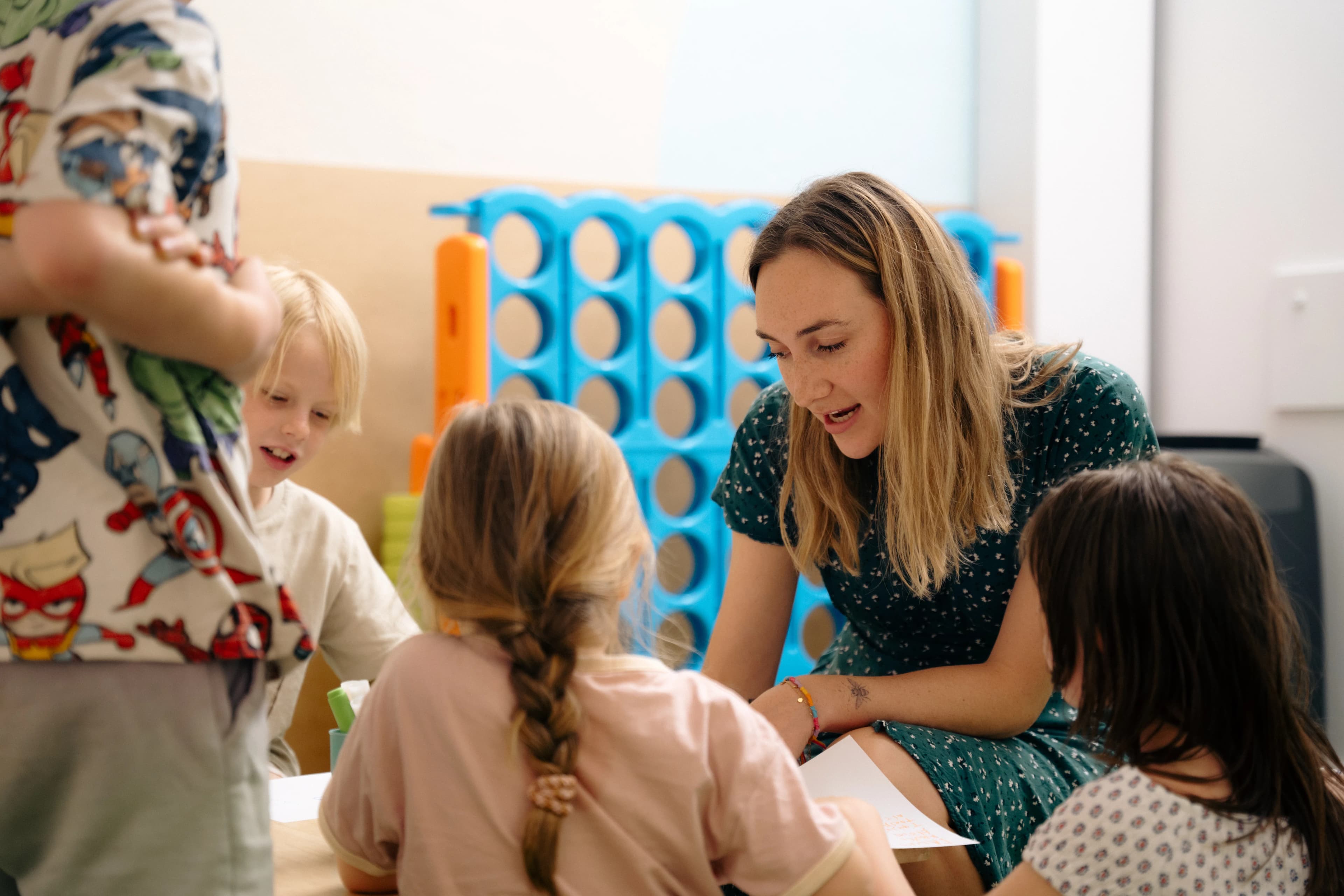 Rebecca, educational therapist, working with a child
